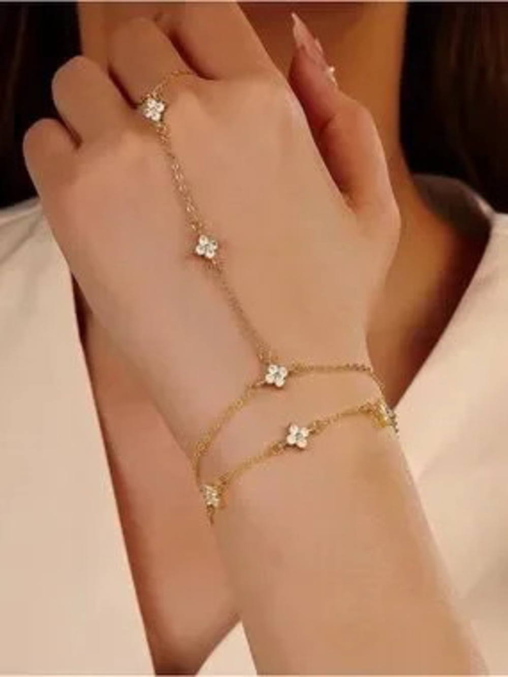 Anthropologie Gold Tone Floral Hand Chain Bracelet with White Accents